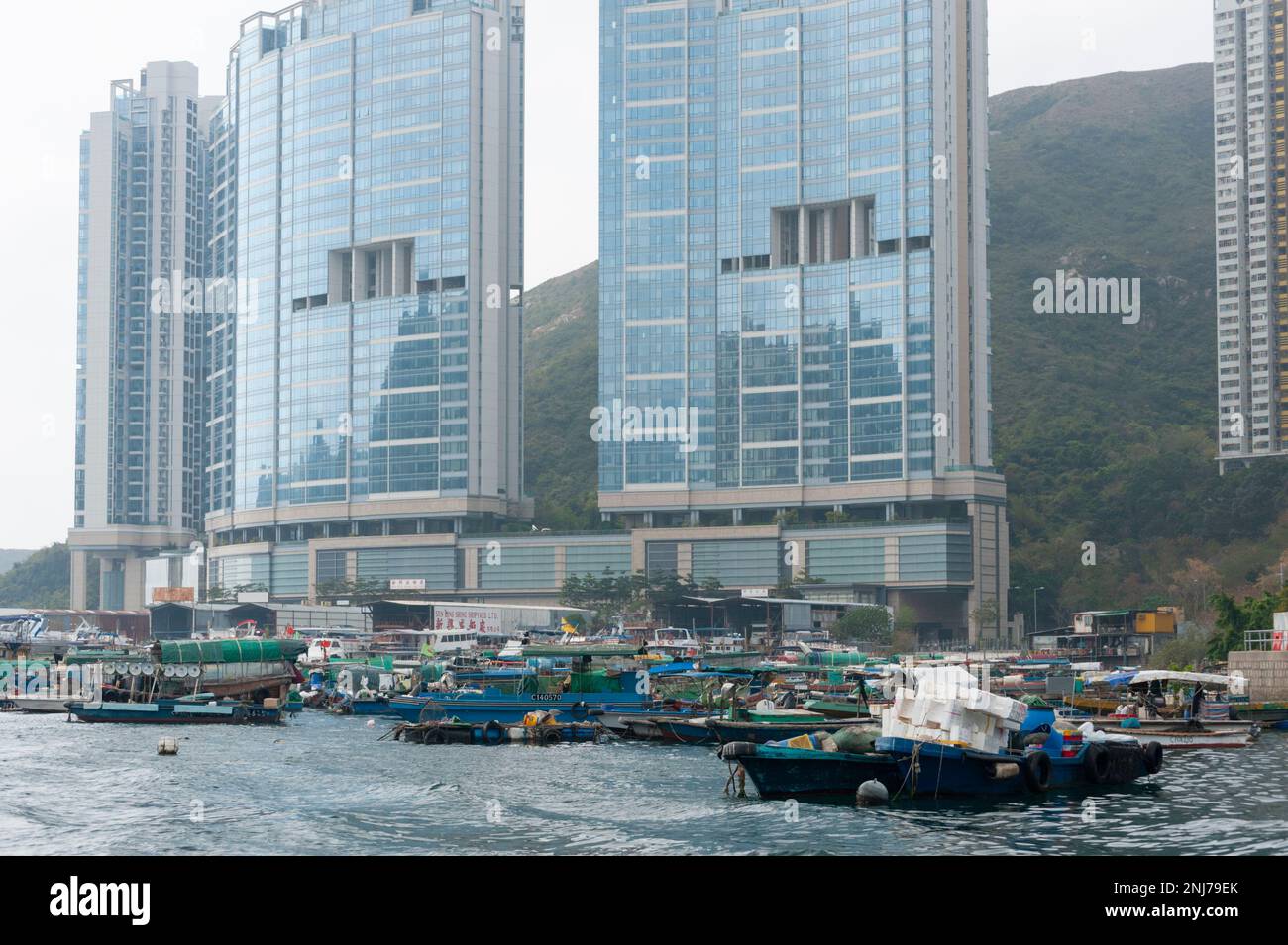 Sampans and fishing boats crowd around the Sun Hing Shipyard, with