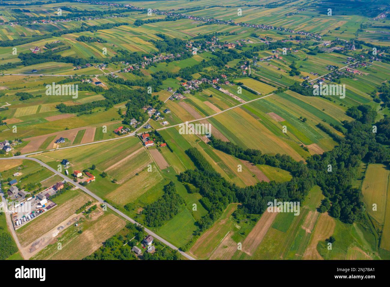 Beautiful countryside scene. Aerial view of rural road, agribusiness, livestock, pasture. Great landscape. Rural scene. Agriculcure scene. Farm scene. Stock Photo
