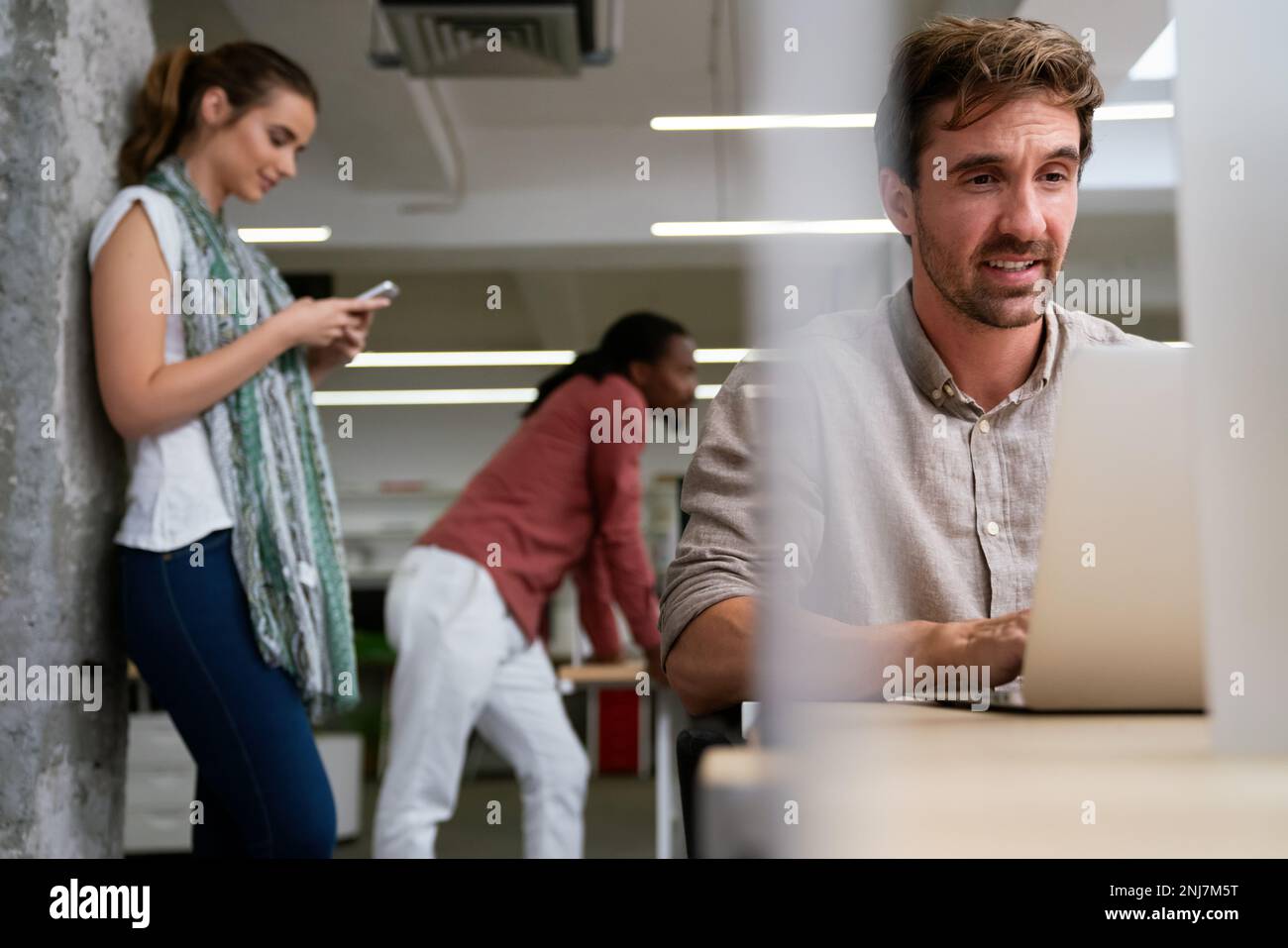 Programmers cooperating at IT company developing apps. People business work office concept Stock Photo