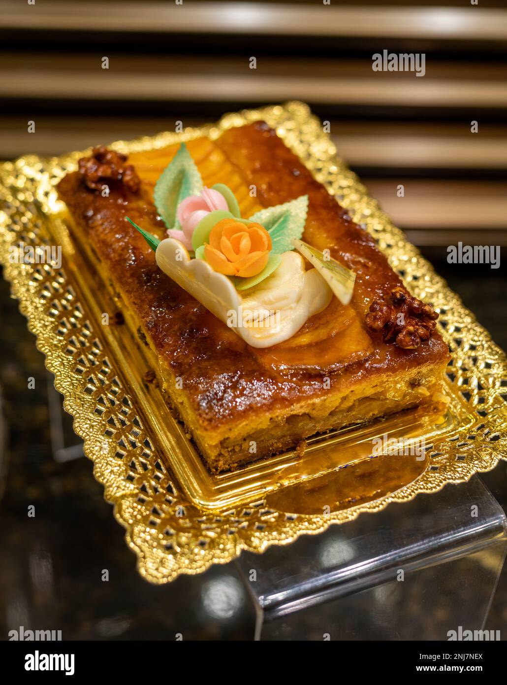 Delicious fresh baked colorful decorated cakes, tarts with cream and ...