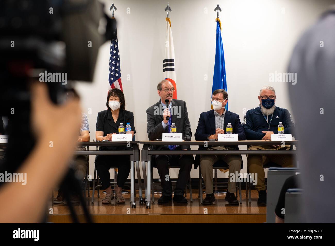 Kenneth Jucks, Upper Atmosphere Research Program manager, answers questions from journalists during a NASA media event at Osan Air Base, Republic of Korea, Aug. 5, 2022. The panel enabled local news agencies to gain a better understanding of the Asian Summer Monsoon Chemical and Climate Impact Project through open discussion and visual aids. Stock Photo