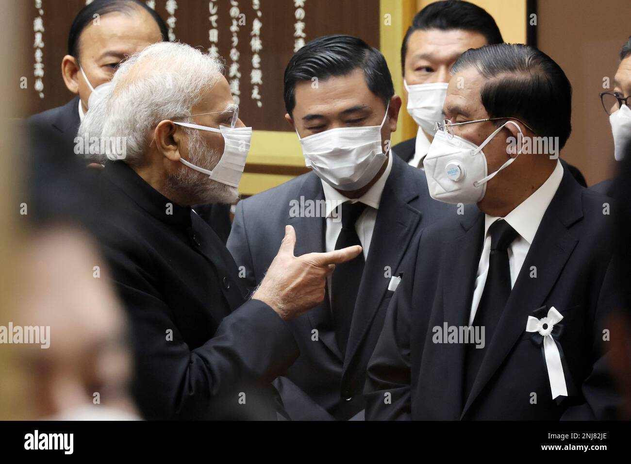 Indian Prime Minister Narendra Modi, left, speaks with his Cambodian  counterpart Hun Sen after they attended the state funeral for former Prime  Minister Shinzo Abe, the longest-serving leader in his nation's modern