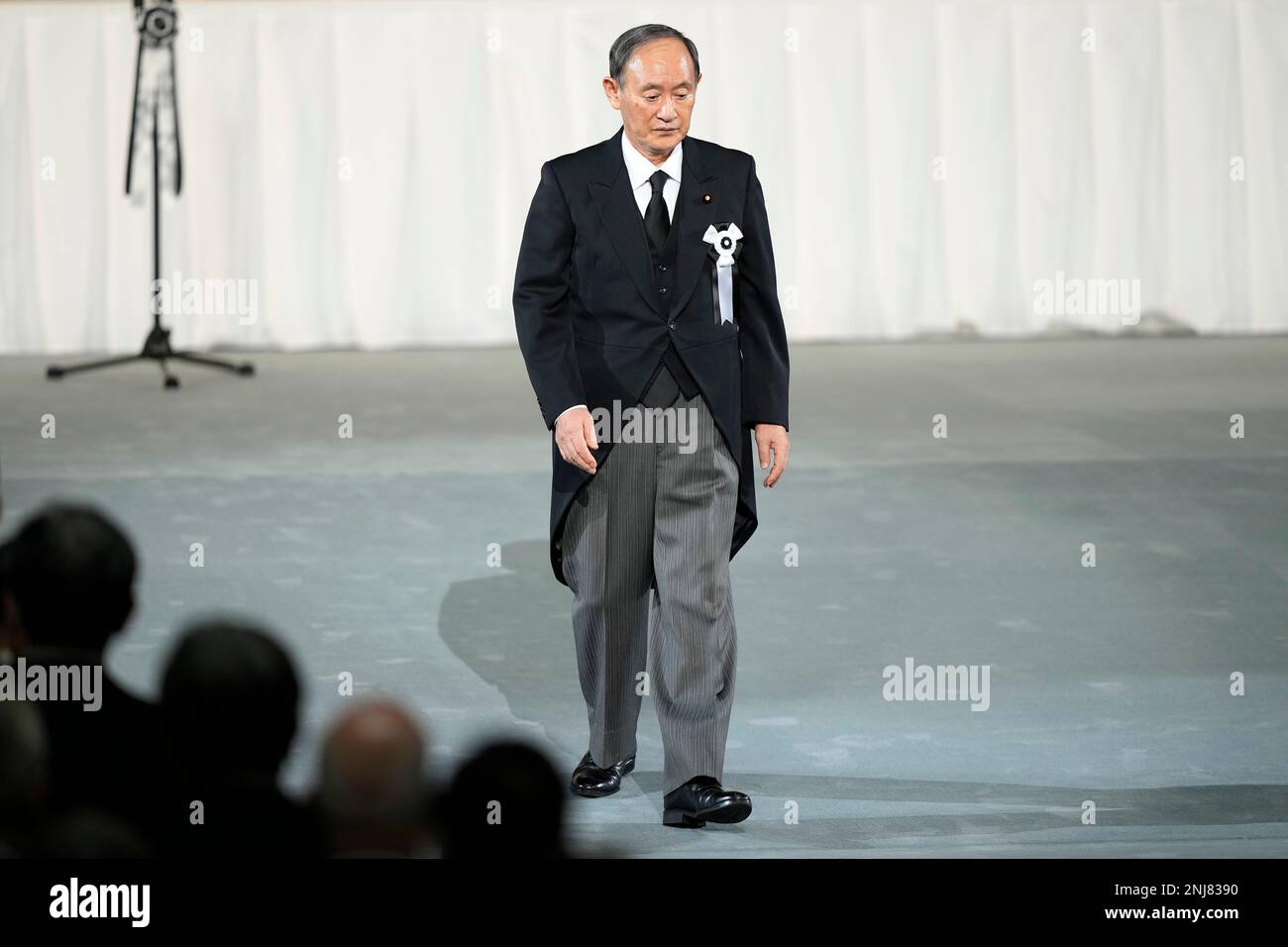 Japanese Speaker of the House of Representatives Hiroyuki Hosoda walks