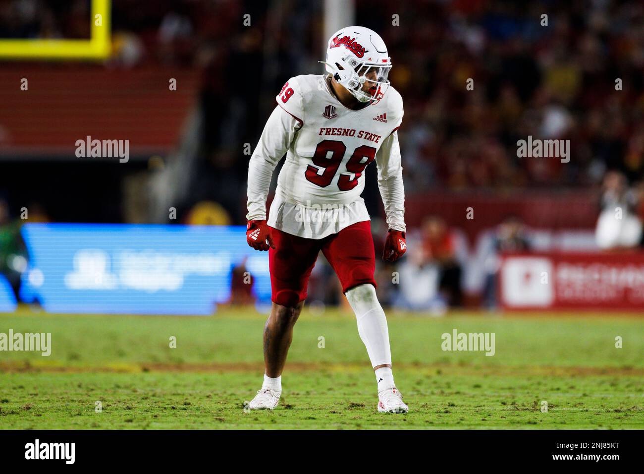 Fresno State Bulldogs defensive end David Perales (99) defends during ...