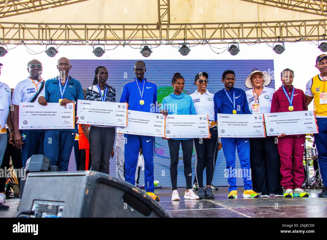 The winners receiving their medals and cheques at the 8th edition of the Access Bank Lagos City Marathon. Lagos, Nigeria. Stock Photo