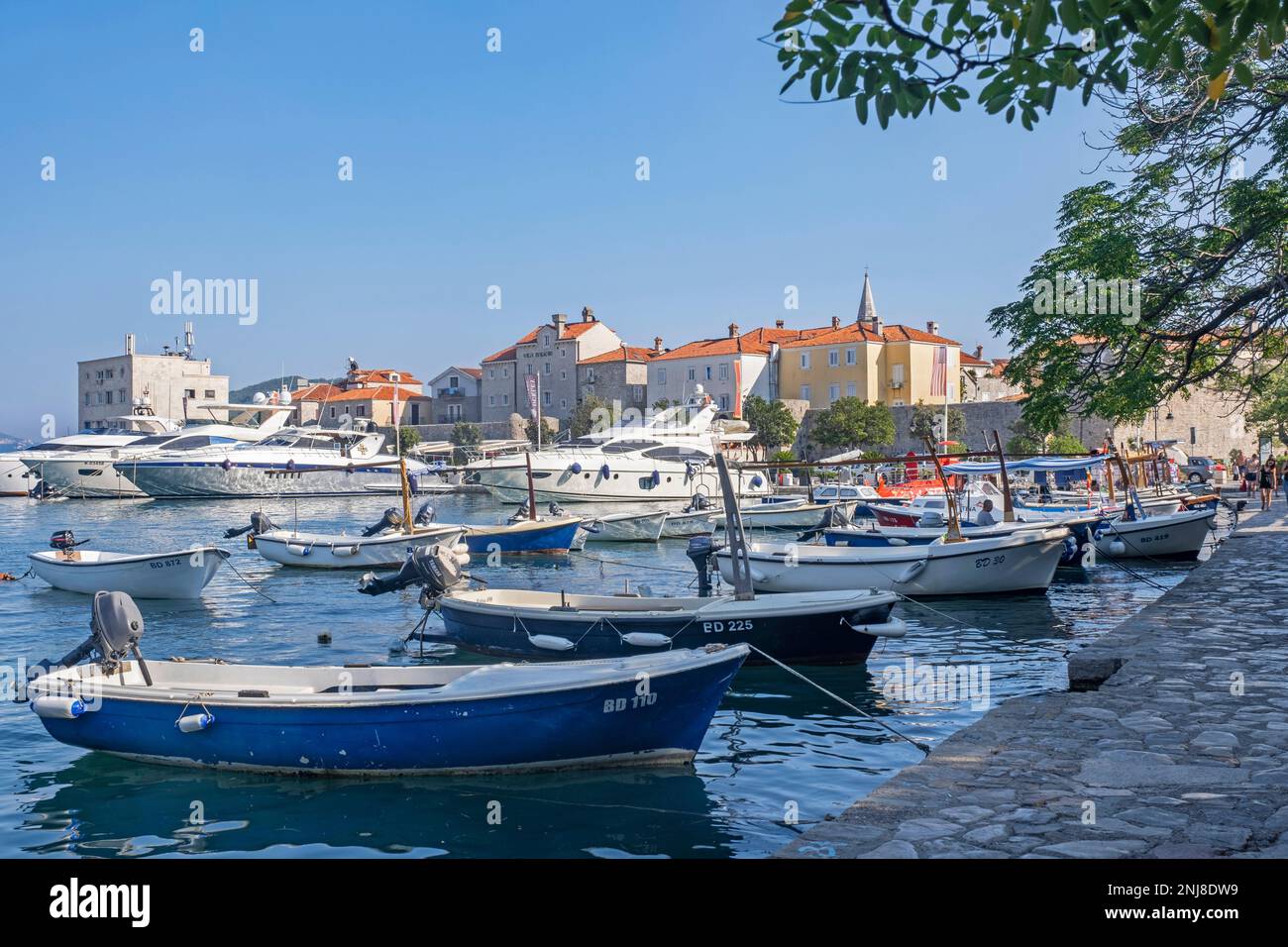 Small fishing boats and motor yachts in marina north of the Old Town