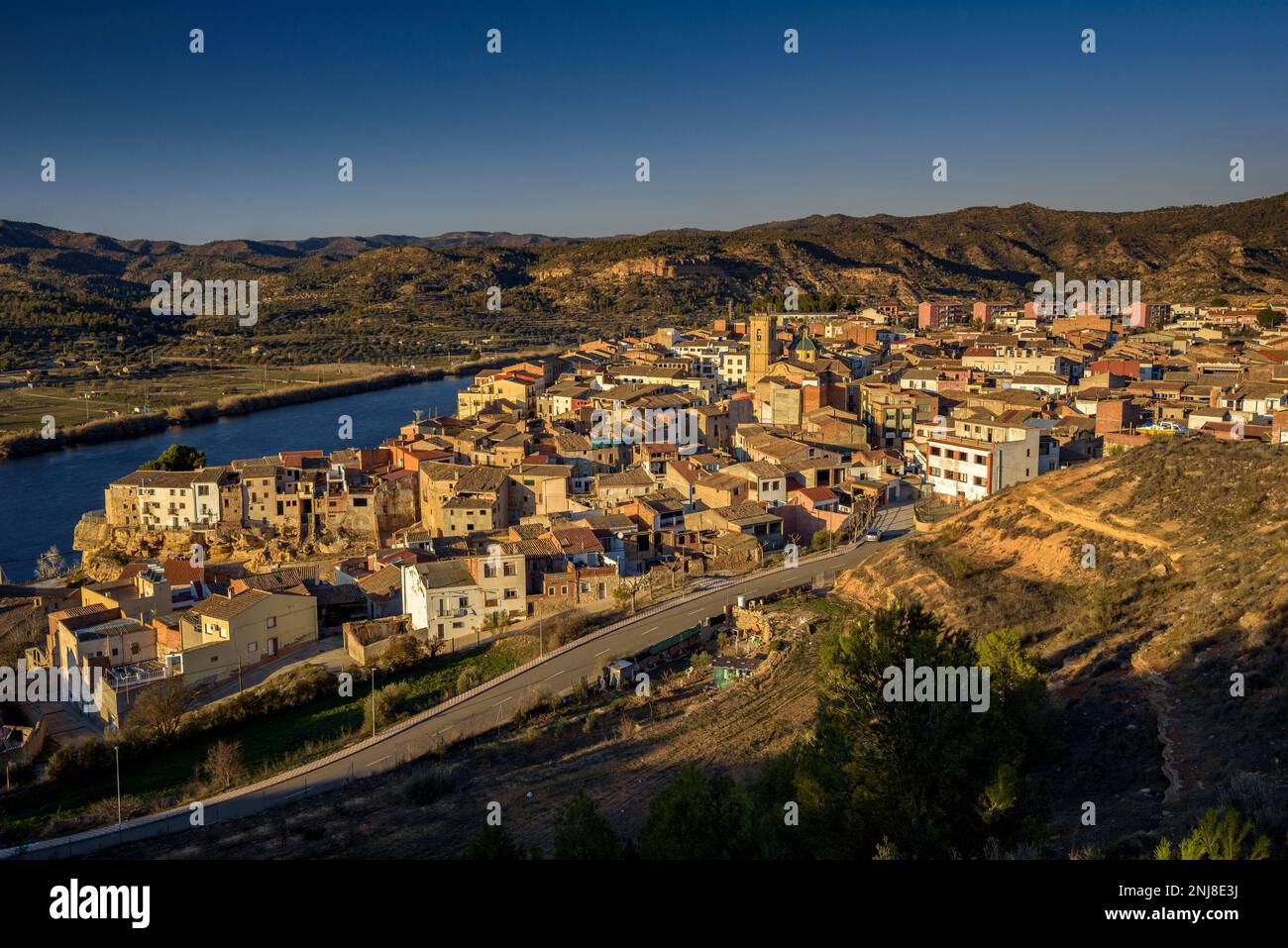 Ribaroja d'Ebre village at sunset, next to the Ebro river (Ribera d