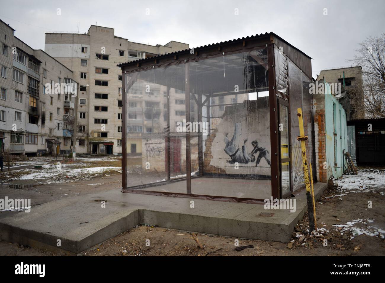 BORODIANKA, UKRAINE - NOVEMBER 22, 2022 - Shockproof walls seal the art piece that features a boy defeating an adult man in judo sparring by British a Stock Photo