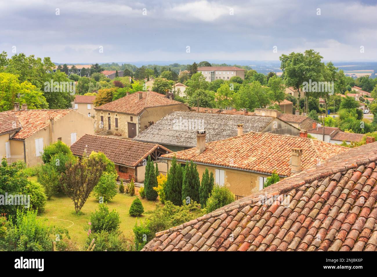 Summer city landscape view of the roofs of houses in a provincial