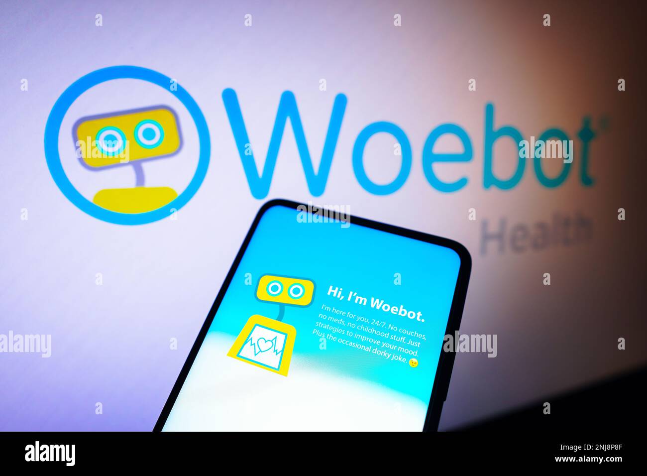 In this photo illustration, the Woebot Health logo is seen displayed on