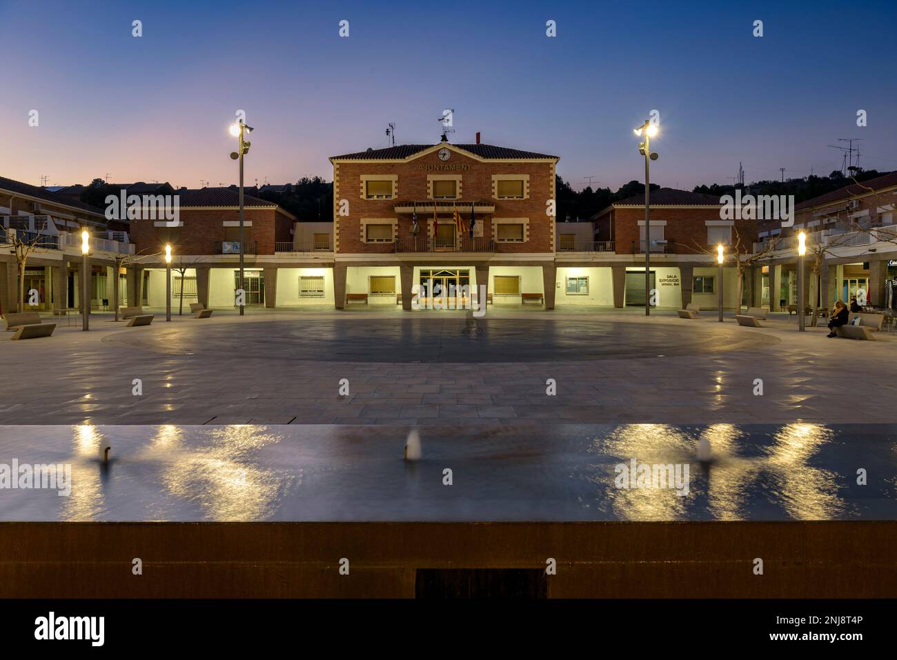Twilight and blue hour in the Town Hall square of the new town of Mequinenza, Bajo Cinca, Zaragoza, Aragon, Spain ESP: Crepúsculo en Mequinenza Aragón Stock Photo