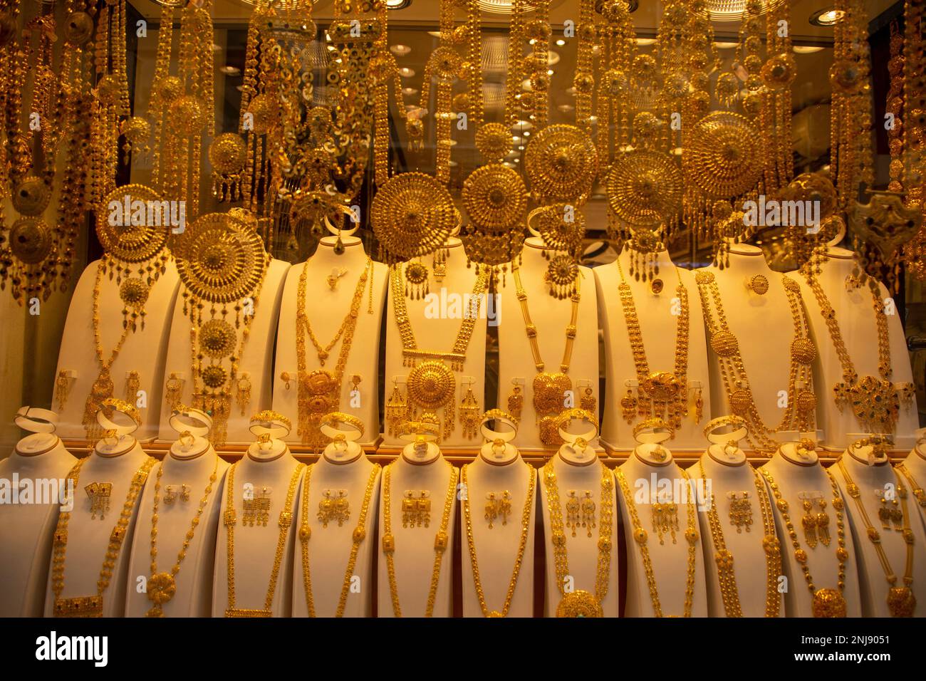 Gold jewellery displayed in shop hires stock photography and images