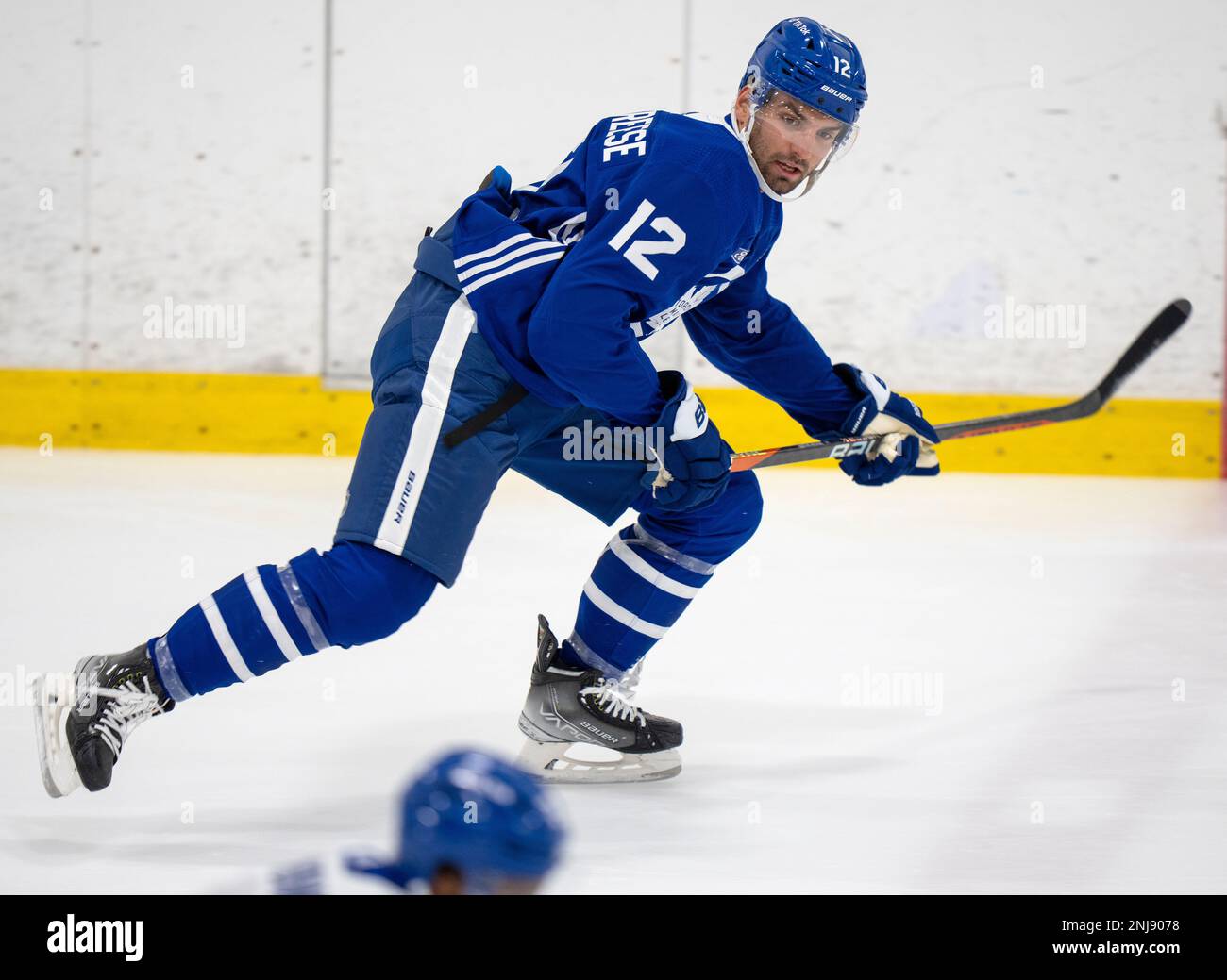 Toronto Maple Leafs' Zach AstonReese skates down the ice during the