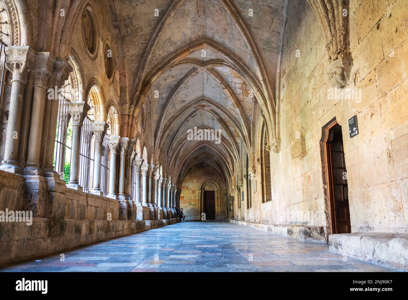 TARRAGONA, SPAIN - AUGUST 6, 2022: Cloister of the Cathedral of Tarragona, a Roman Catholic Church built in early-12th-century in Romanesque architect Stock Photo