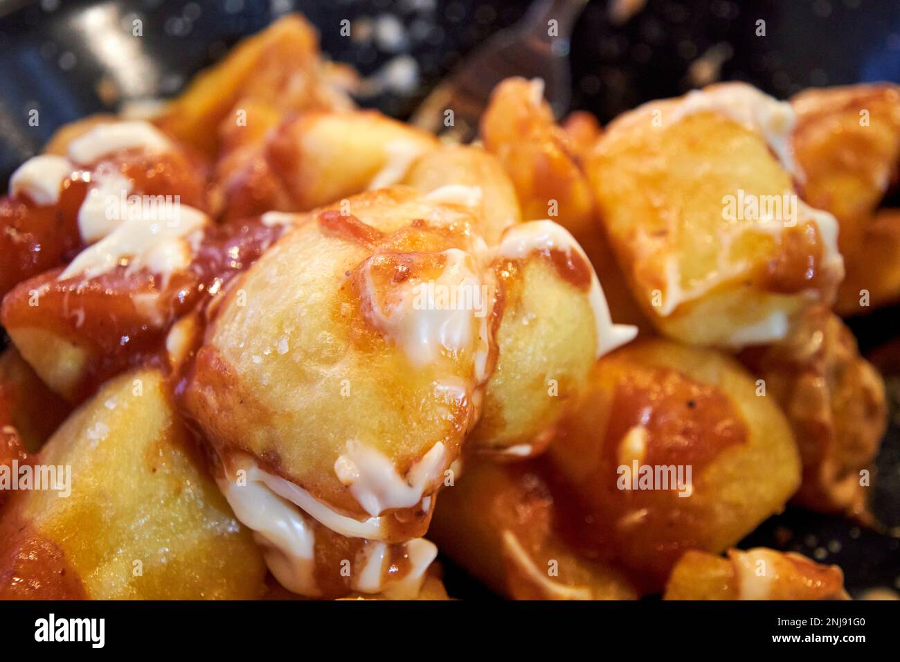 plate of patatas bravas potatoes in Lanzarote, Canary Islands, Spain