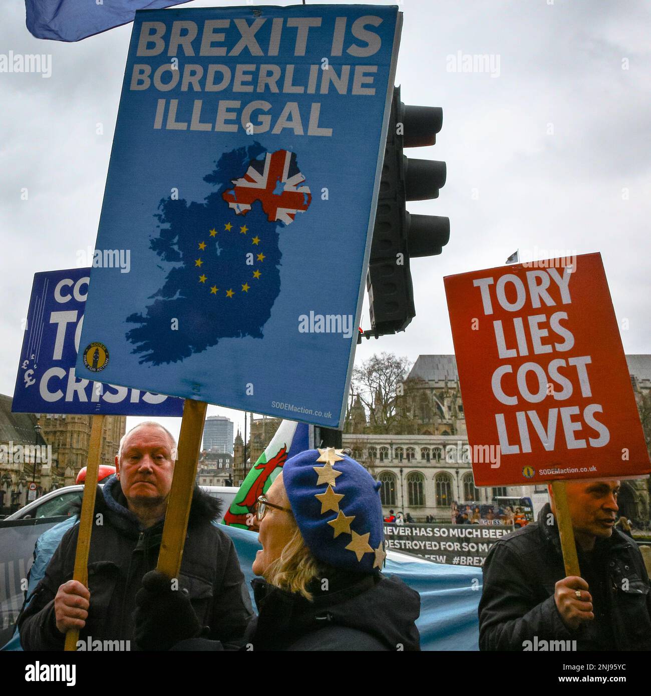 Westminster, London, UK. 22nd Feb, 2023. Protesters with placards. Anti-Brexit protesters opposite Parliament lead on a theme of current UK fruit and vegetable shortages, which are in part blamed on Brexit related supply chain issues, and the on-goin row over the Northern Ireland protocol, which continues to strain UK-EU relations. Credit: Imageplotter/Alamy Live News Stock Photo