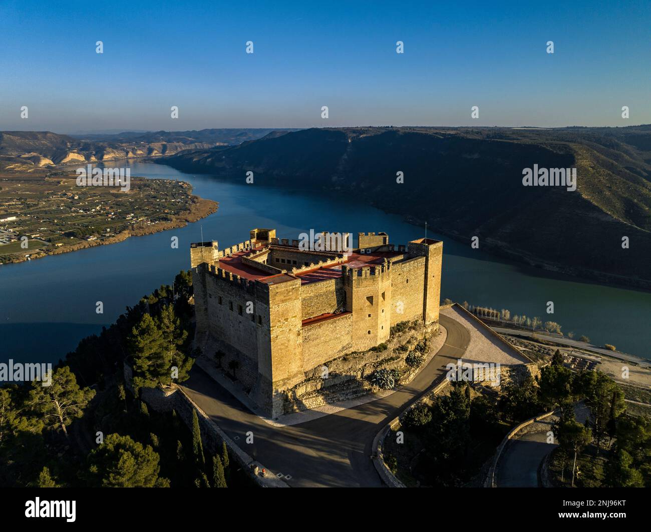 Aerial view of the castle of Mequinenza and the confluence of the Segre and Ebro rivers (Bajo Cinca, Zaragoza, Aragon, Spain) Stock Photo
