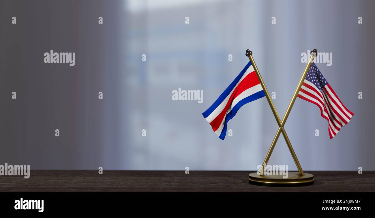 Costa Rica and USA flags on table. Negotiation between Costa Rica and United States. on little blur background. 3D work and 3D image Stock Photo