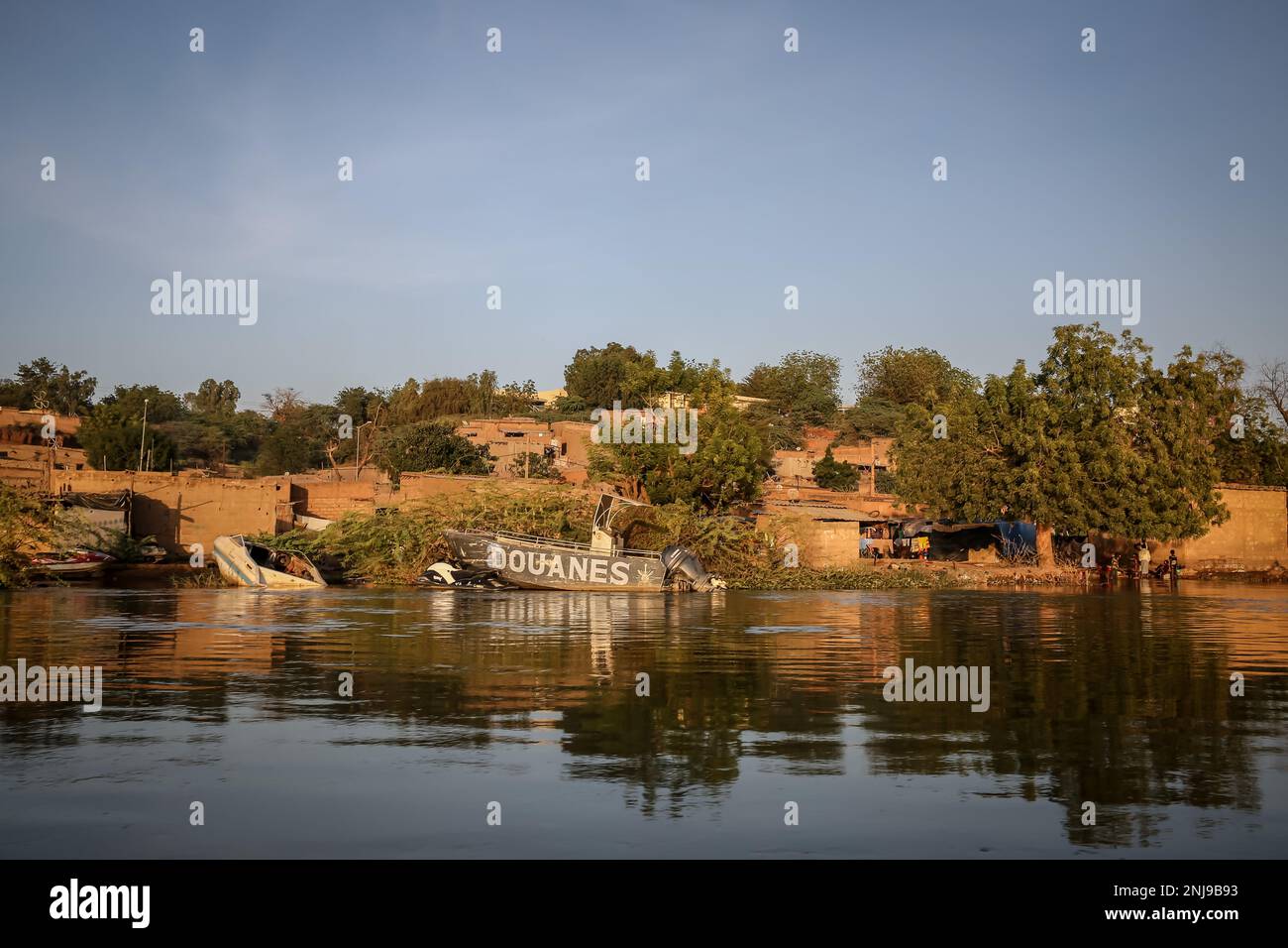 Boats are seen along the bank of the Niger River in Niamey. Niger a