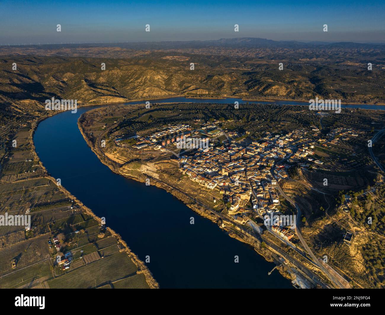 Aerial view of the Ebro river and the town of Ribaroja d'Ebre at