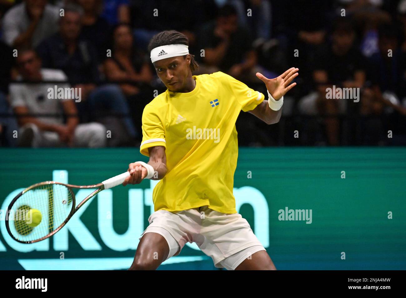 Swedens Mikael Ymer returns a ball to Italys Janni Sinner during their Davis Cup tennis match at the Unipol Arena in Bologna, Italy, Sunday, Sept