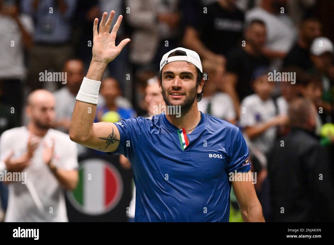 Italys Matteo Berrettini celebrates after beating Argentinas Sebastian Baez during their Davis Cup tennis match in Bologna, Italy, Friday, Sept