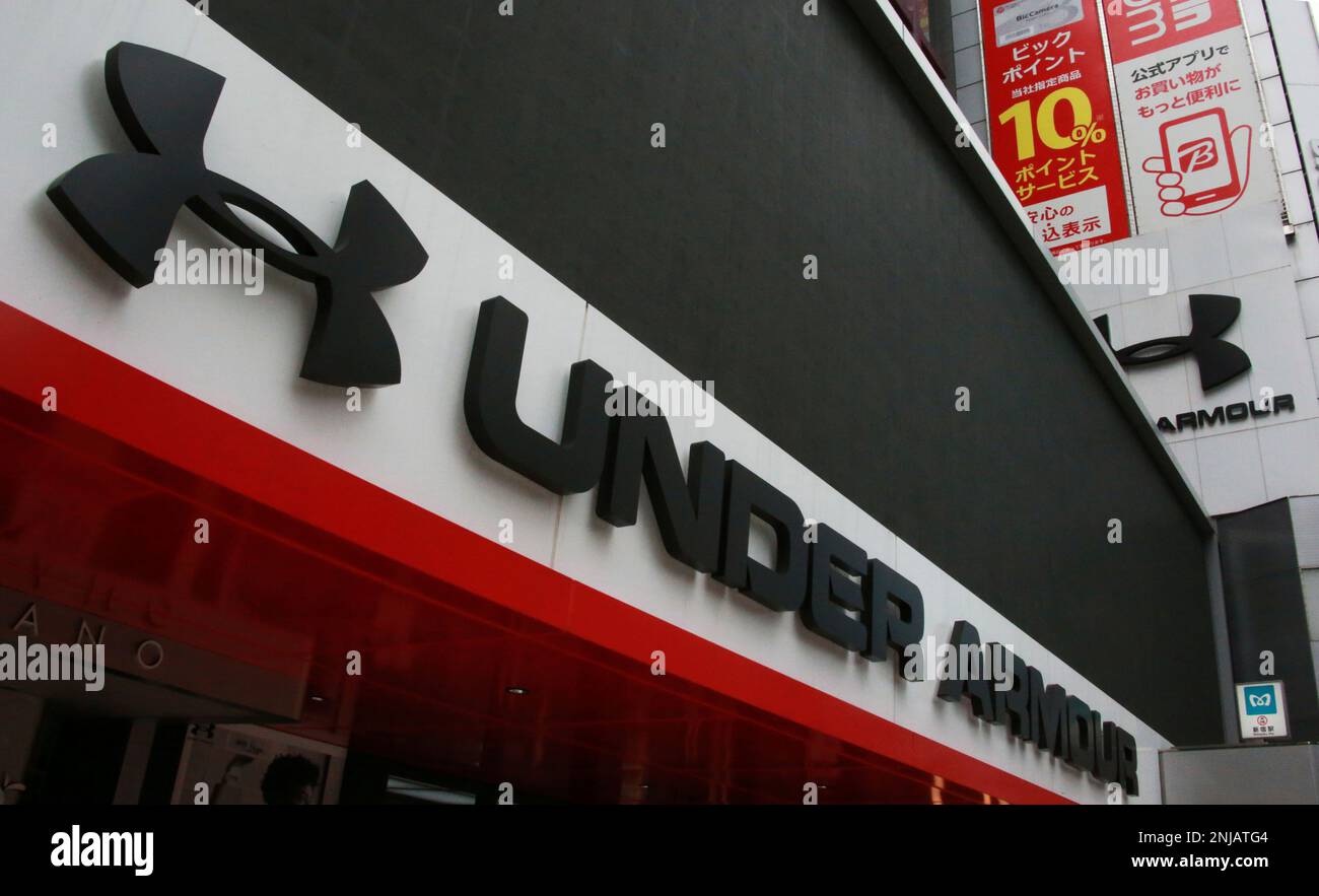 The trademark of Under Armour, Inc. is seen in Shinjuku Ward, Tokyo on  April 24, 2022. Under Armour is an American sports equipment company that  manufactures footwear, sports and casual apparel.( The