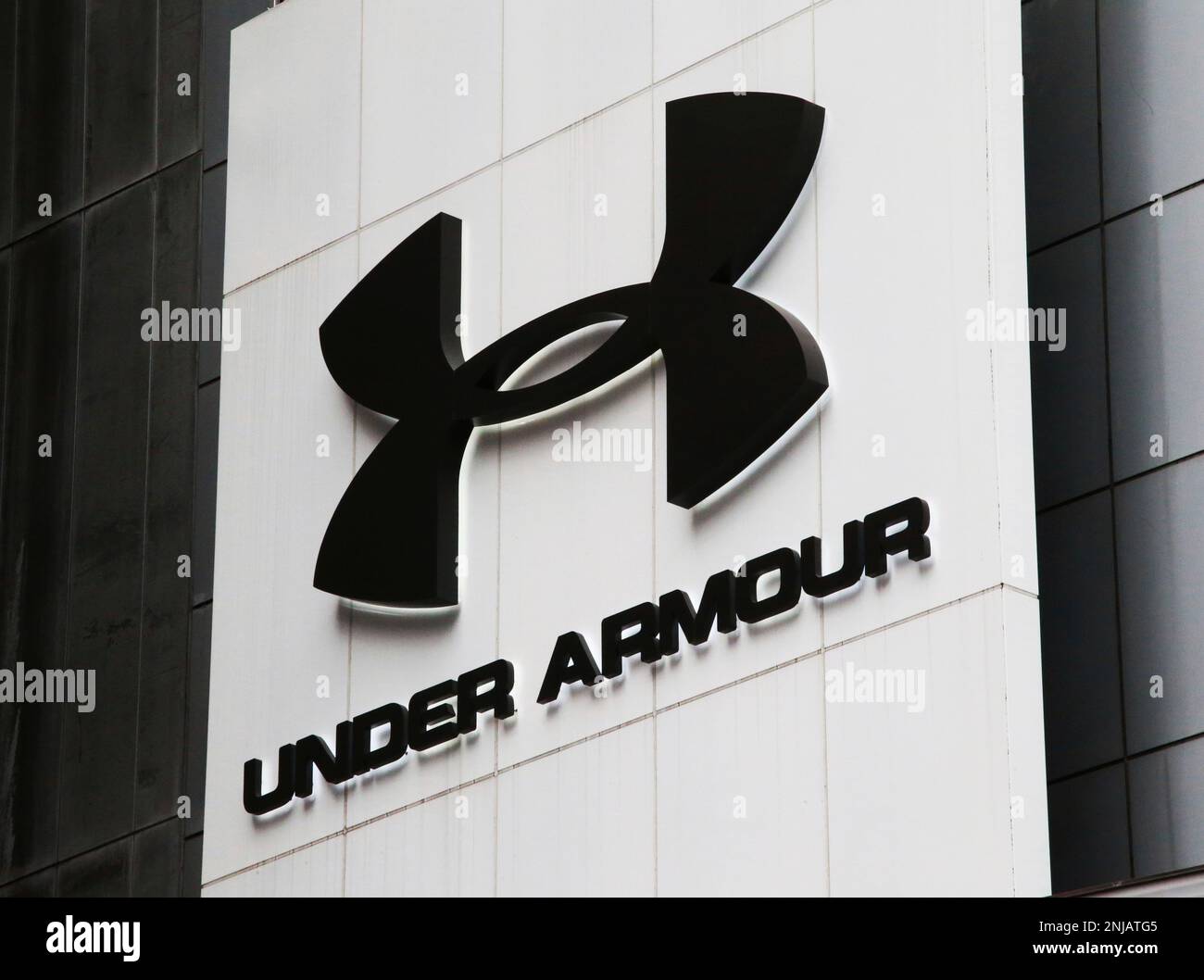 The trademark of Under Armour, Inc. is seen in Shinjuku Ward, Tokyo on  April 24, 2022. Under Armour is an American sports equipment company that  manufactures footwear, sports and casual apparel.( The