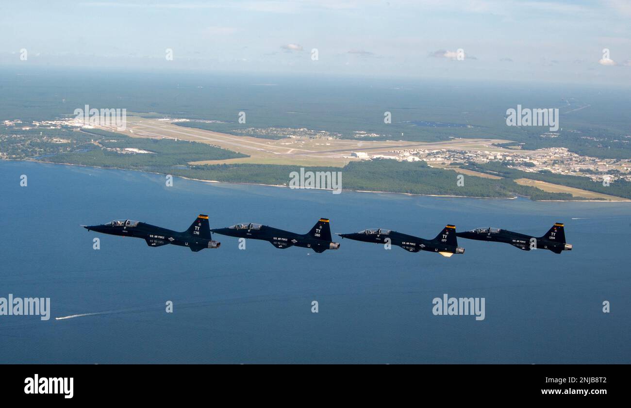 Four U.S. Air Force T-38A Talons assigned to the 2d Fighter Training Squadron fly over the Florida Panhandle, Aug. 6, 2022. The 2d FTS, stationed out of Eglin Air Force Base, Florida, provides air-to-air threat replication in support of combat and formal training units. Stock Photo