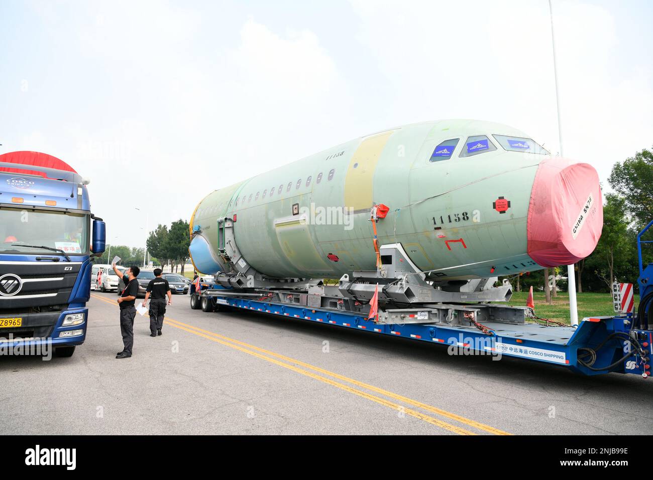 Trucks carry the first batch of two large parts of A321, from Hamburg ...