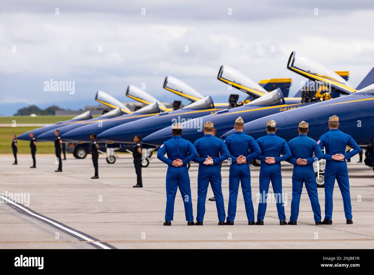 Pilots of the Blue Angels flight demonstration squadron stand ready as ...