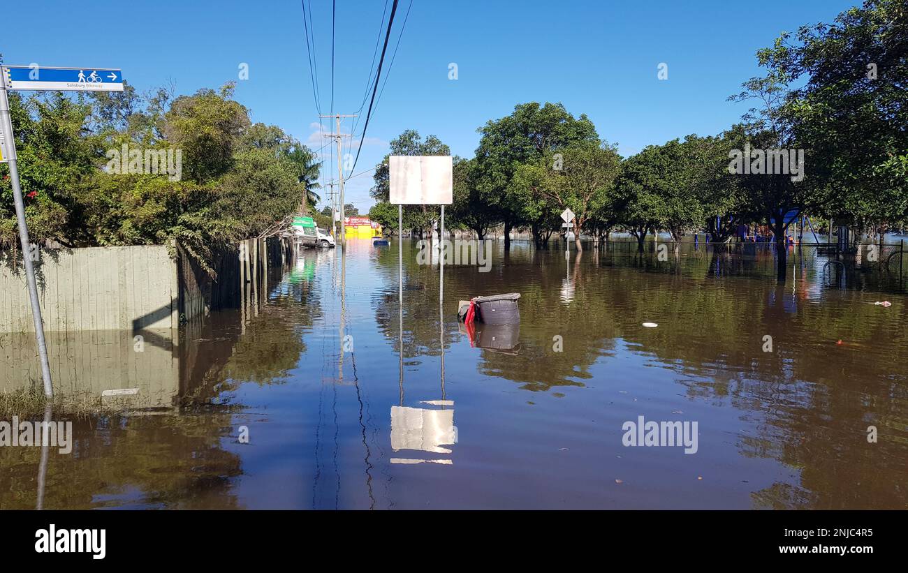 Brisbane, Australia - Mar 1, 2022: Roads flooded and vehicle under water after the heavy rain in Rocklea suburb Stock Photo