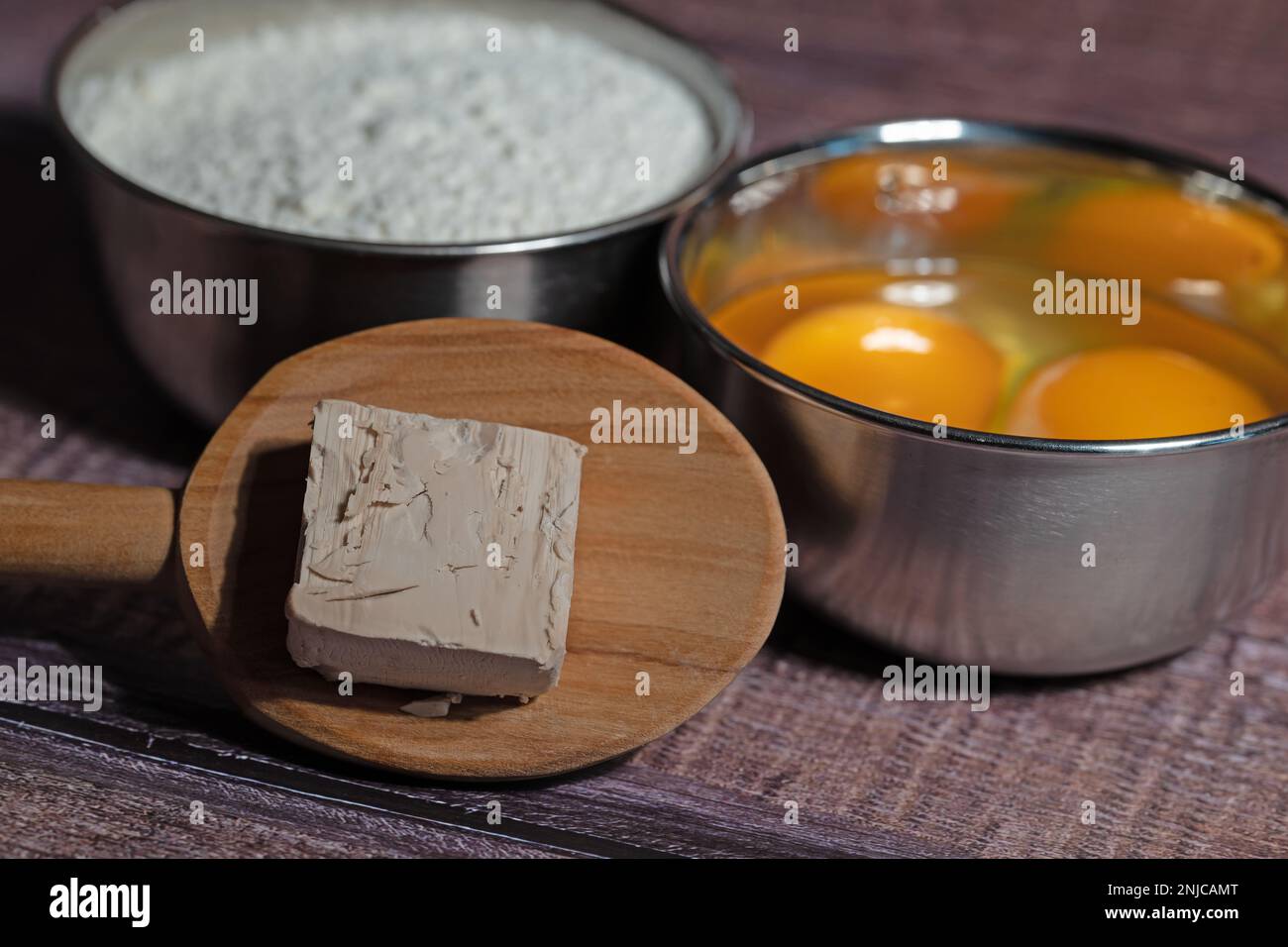 Baking yeast with eggs and flour Stock Photo