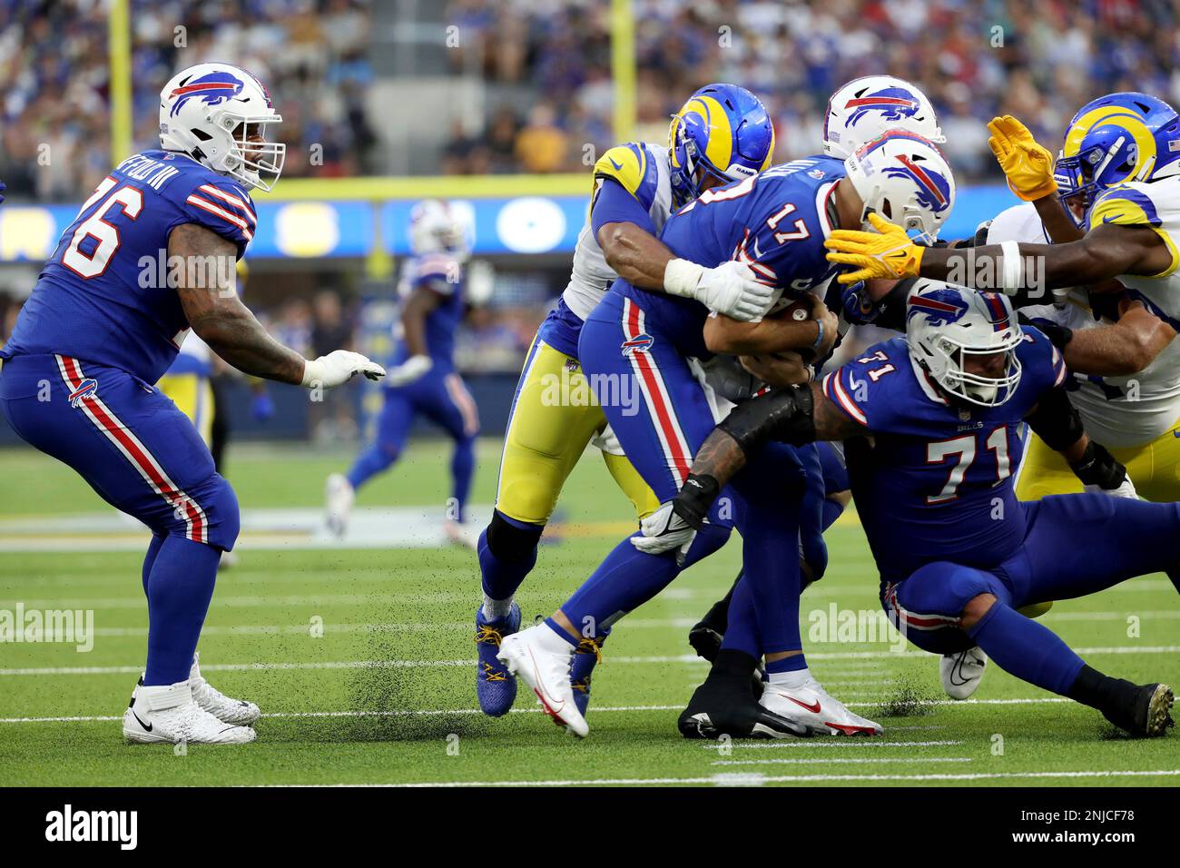 Los Angeles Rams defensive end Aaron Donald sledgehammers Buffalo Bills  quarterback Josh Allen into the ground for career sack number 99