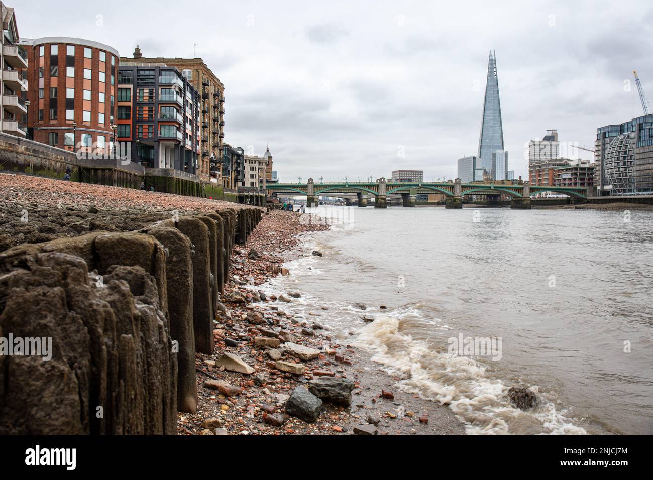 River Thames foreshore during low tide in London, England Stock Photo