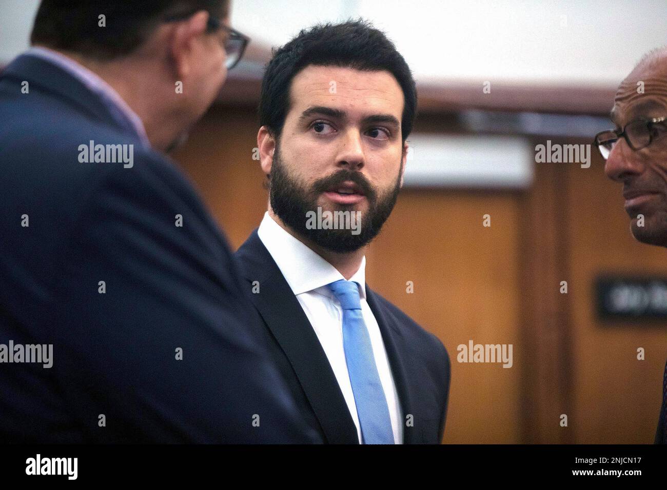 FILE - Mexican soap opera star Pablo Lyle, center, speaks with his lawyers  during a hearing in Miami on Jan. 15, 2020. The judge who will preside over  the trial of Lyle,