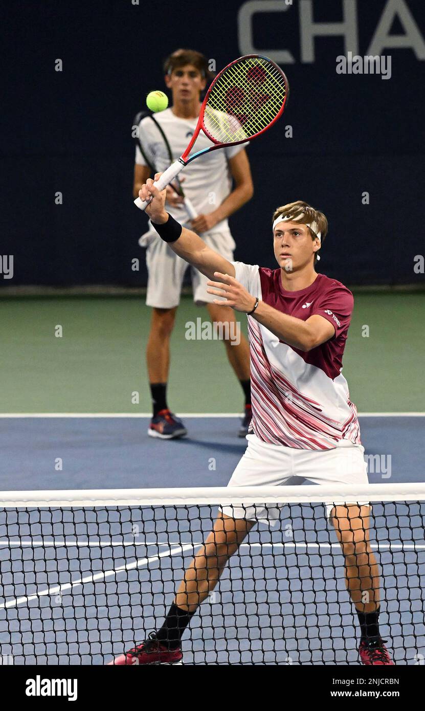 Lautaro Midon returns during a junior boys doubles match at the 2022 US Open, Wednesday, Sep