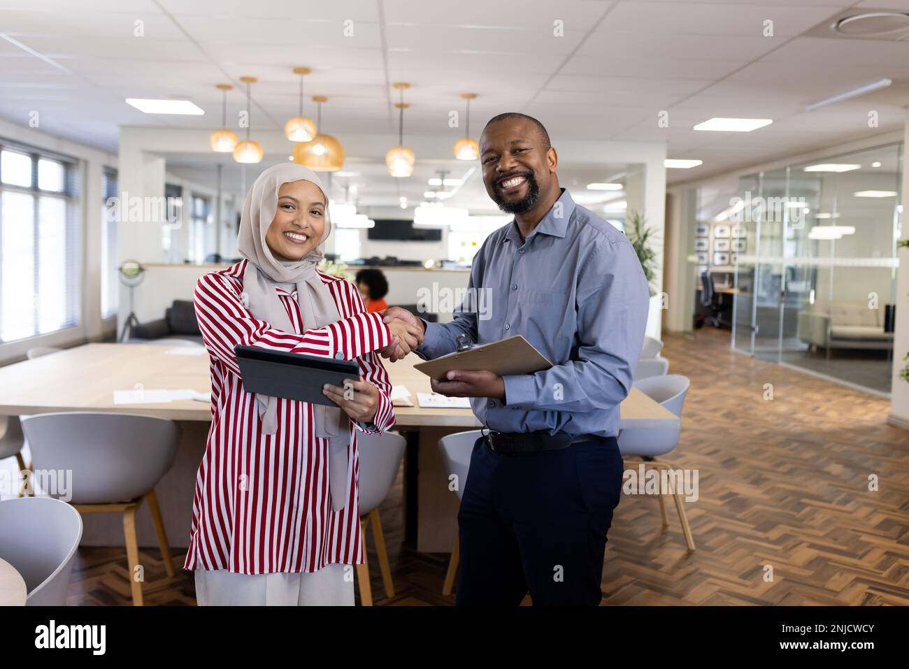 Happy diverse male female business hi-res stock photography and images ...