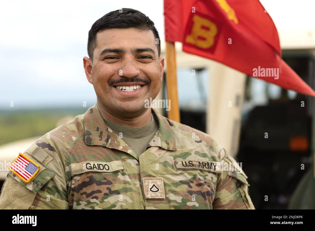 Pfc. Jose Gaido, combat medic with 1st Battalion, 103rd Field Artillery Regiment, stands for a portrait on Aug. 15, 2022, Gaugetown, Canada. Combat medics are an integral part of a field training exercise. Stock Photo