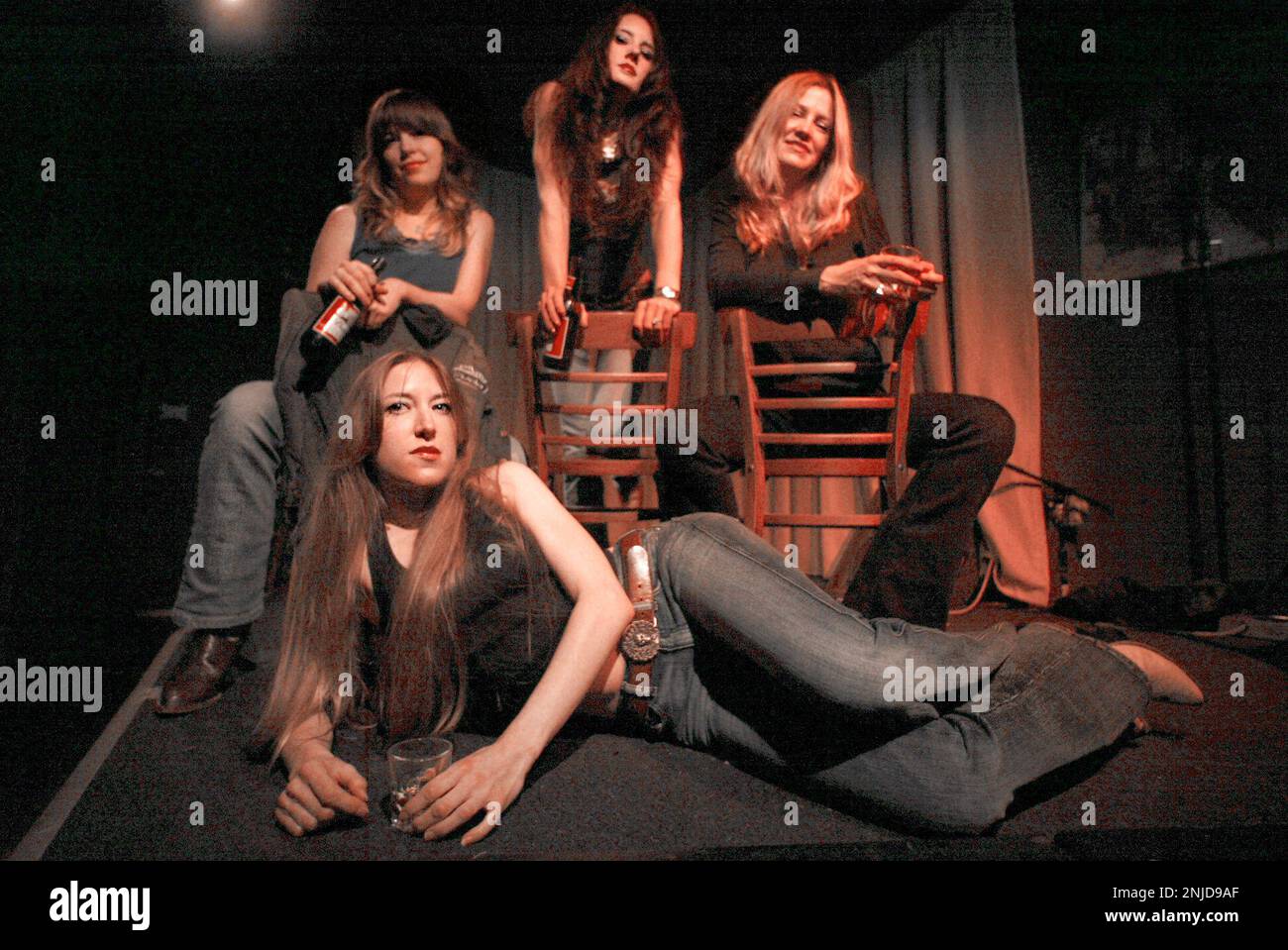 skildring ketcher Hick COVERBANDS07 107 LH.JPG In back is Mallary Young (left, rythym guitar),  Riff Williams (middle, bass), Phyllis Rudd (right, drums). In front is  singer Bonny Scott. AC/DShe is an all-girl AC/DC homage. Shot