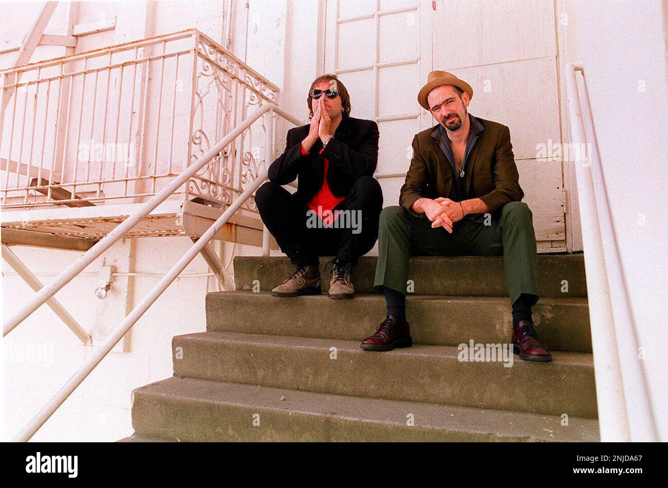 EITZEL 1/C/10MAR97/PK/LHREM guitarist Peter Buck (left) has paired up