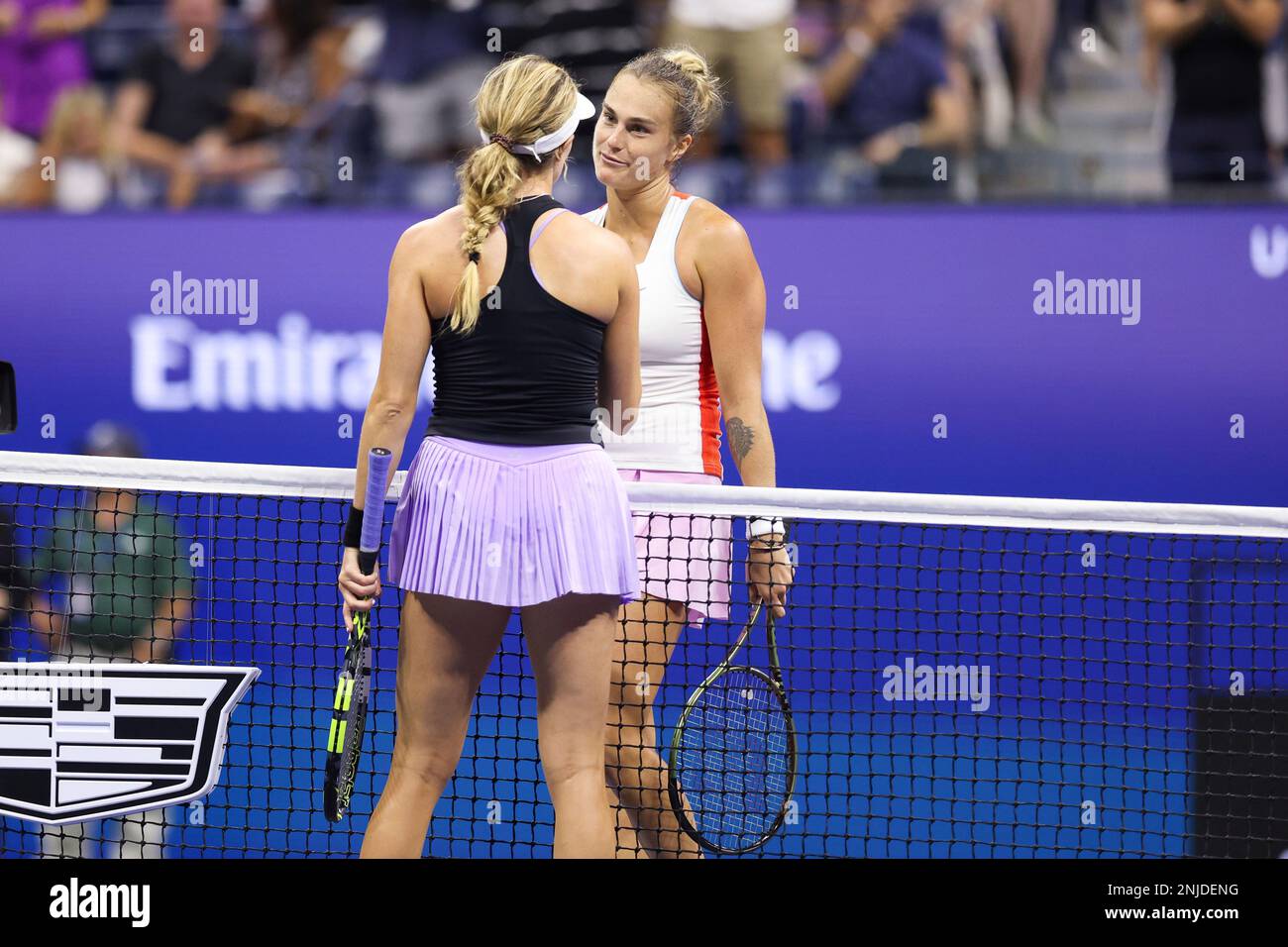 Aryna Sabalenka and Danielle Collins shake hands during a women's