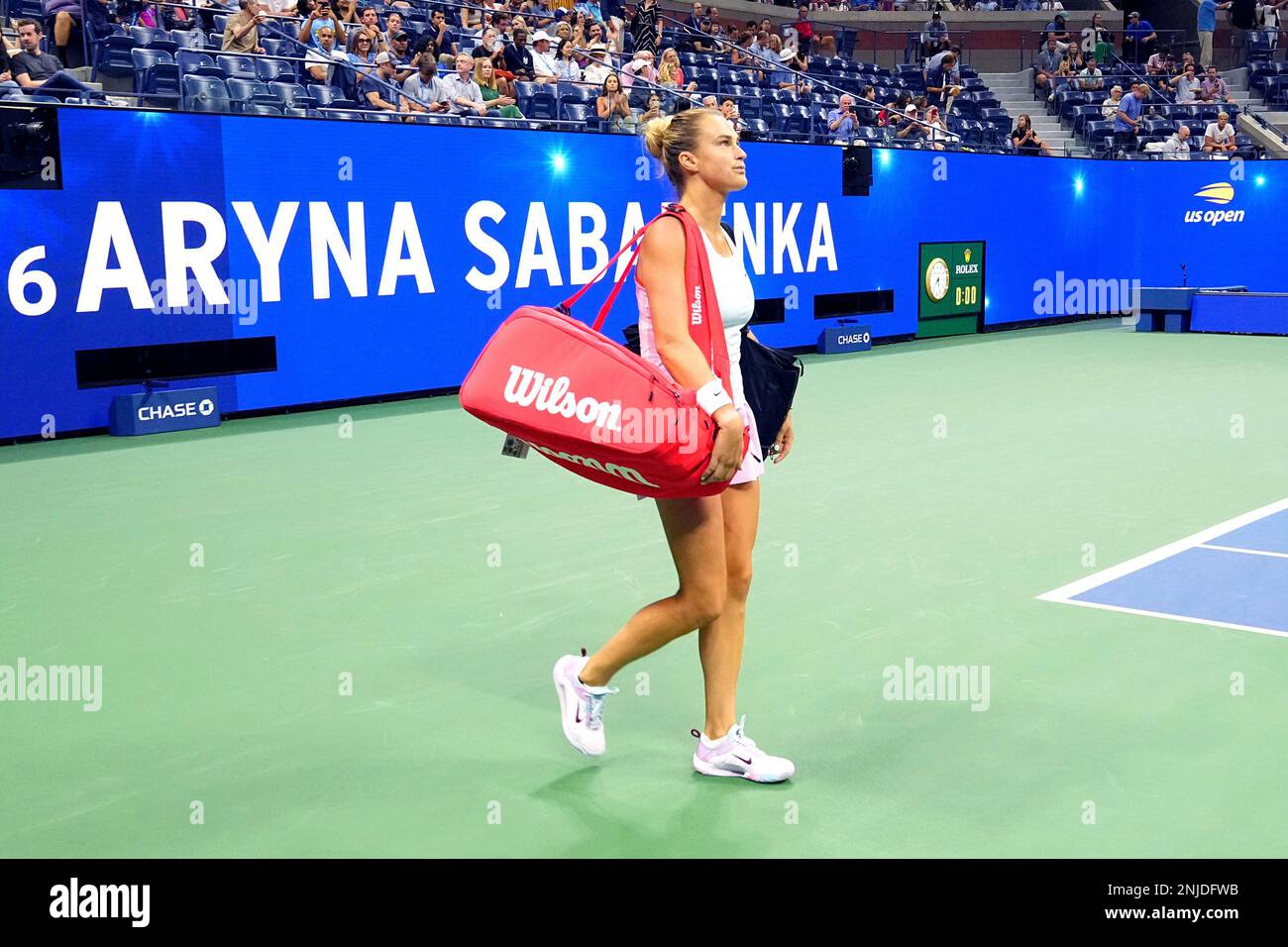 aryna-sabalenka-walks-onto-the-court-during-a-women-s-singles-match-at