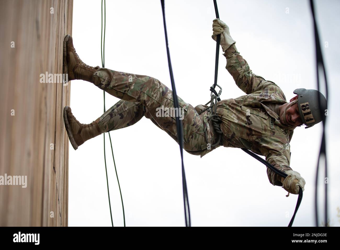 Sgt. Brady Verbrugge, a horizontal construction engineer with Company A, 224th Bridgade Engineer Battalion, Iowa National Guard, rappels from a 34-foot tower at Camp Dodge in Johnston, Iowa, on Sept. 6, 2022. Over 200 Soldiers and Airmen participated in a 12-day U.S. Army Air Assault course held at Camp Dodge, which trains service members in sling-load operations and rappelling as well as being a test of grit. Stock Photo