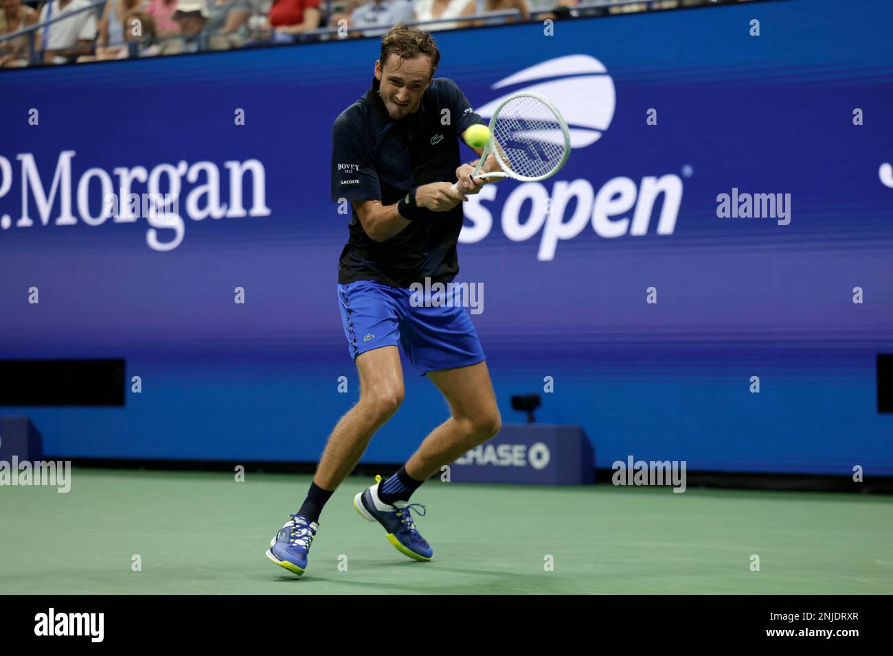 Daniil Medvedev, of Russia, returns a shot to Nick Kyrgios, of Australia, during the fourth round of the U.S. Open tennis championships, Sunday, Sept