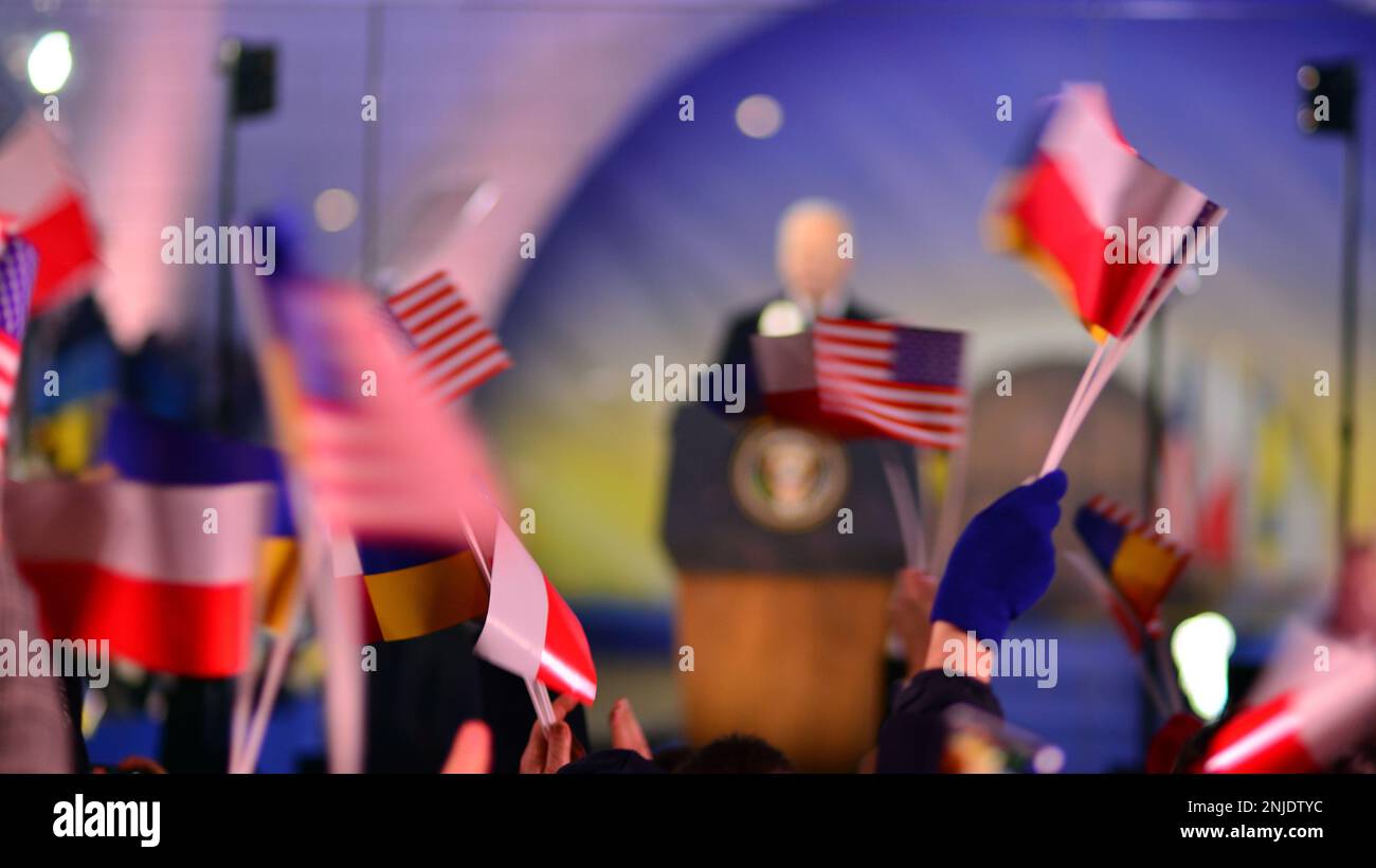 Politician in suit  and  of  flags  Blurred picture Stock Photo