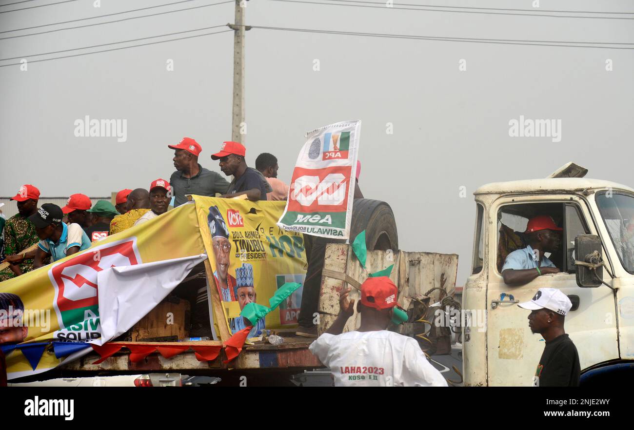 Lagos, Nigeria February 21, 2023 Party supporters in a bus as Asiwaju Bola Ahmed Tinubu, Presidential candidate, All Progressives Congress (APC) for 2023 Elections holds grand finale of his campaign at the Teslim Balogun Stadium in Surulere, Lagos on Tuesday, February 21, 2023. Photo by Adekunle Ajayi Stock Photo