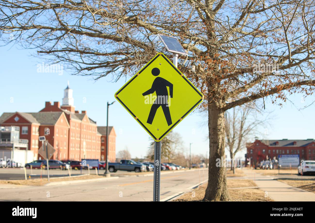 Pedestrian and children school zone yellow warning sign caution road sign Stock Photo