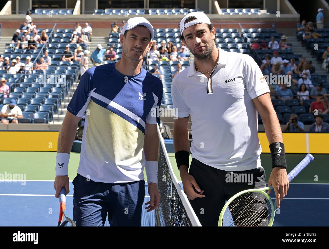 Andy Murray and Matteo Berrettini pose for a photo before a mens singles match at the 2022 US Open, Friday, Sep