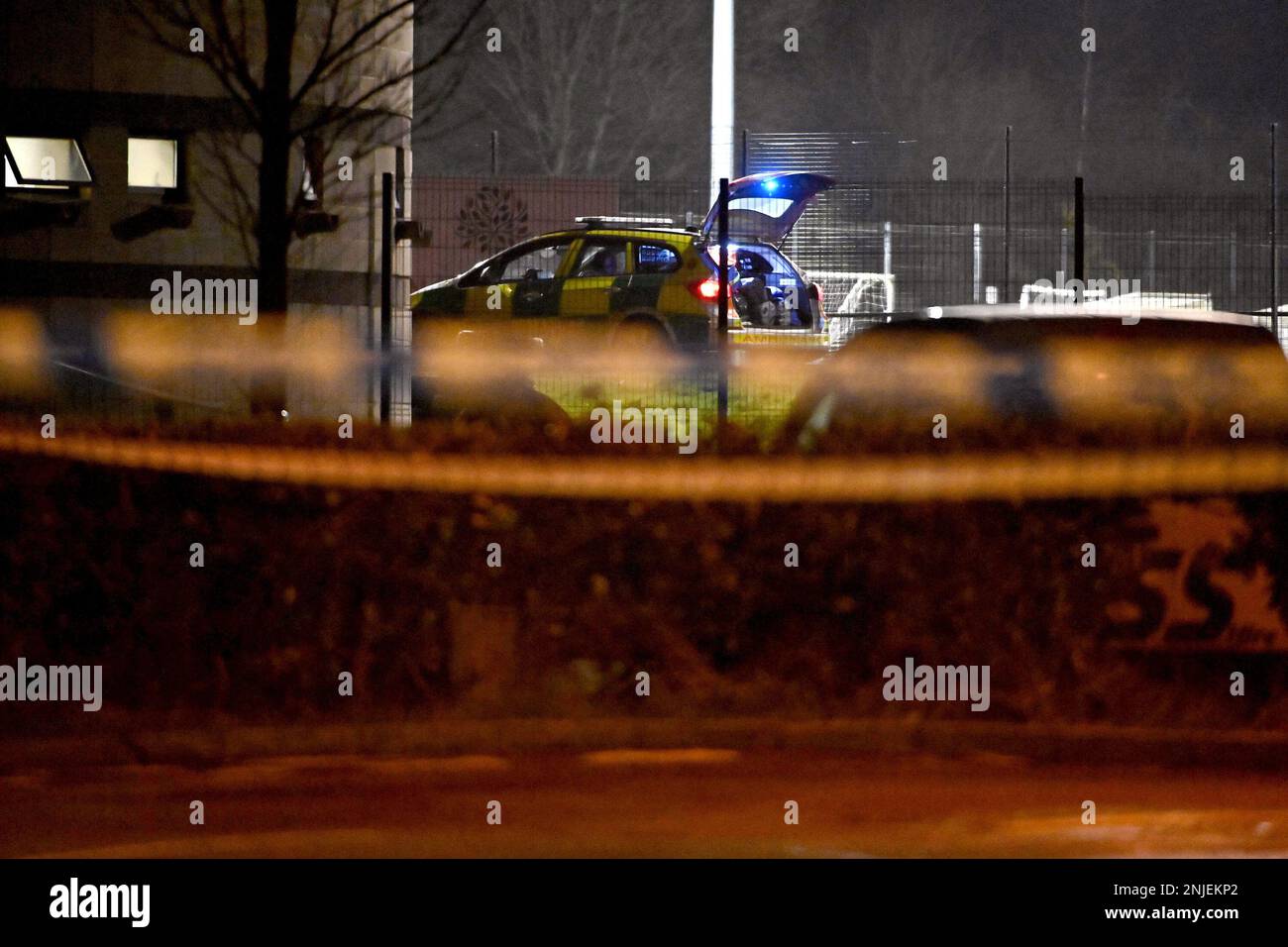 PSNI officers at the scene of a shooting in the Killyclogher Road area